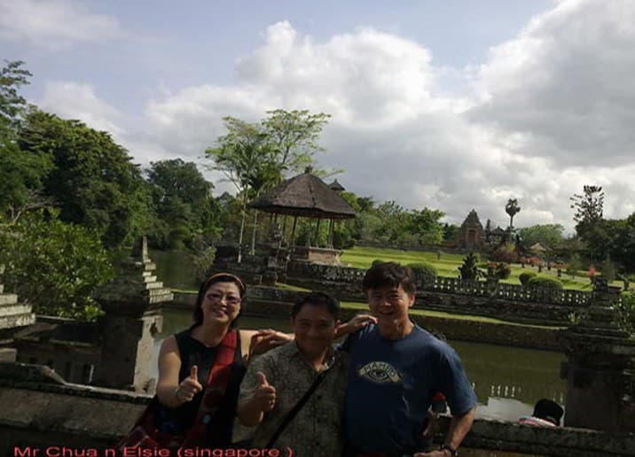 Happy family touring Bali scenic highlands with driver Charlie